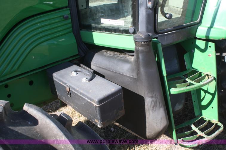 image for item V9511 2005 John Deere 6420 MFWD tractor
