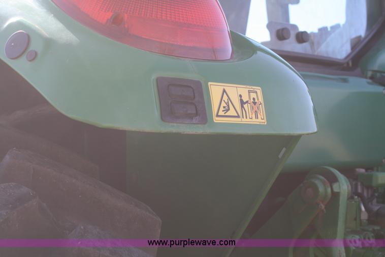 image for item V9511 2005 John Deere 6420 MFWD tractor