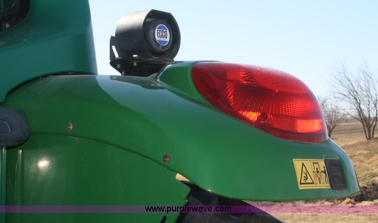 image for item V9511 2005 John Deere 6420 MFWD tractor