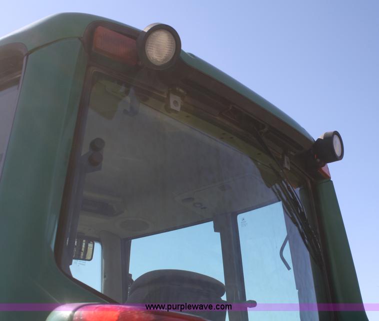 image for item V9511 2005 John Deere 6420 MFWD tractor