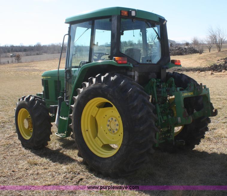 image for item V9512 2001 John Deere 6410 MFWD tractor