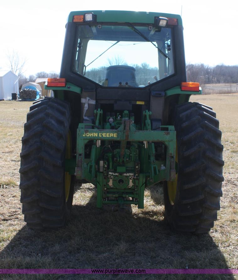 image for item V9512 2001 John Deere 6410 MFWD tractor