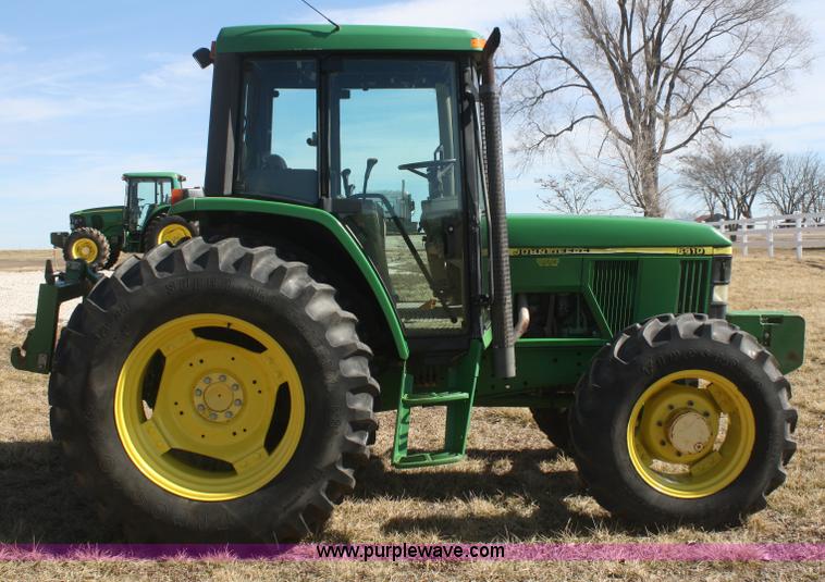 image for item V9512 2001 John Deere 6410 MFWD tractor