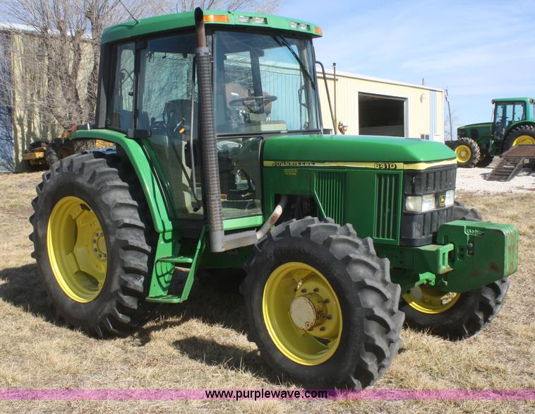 image for item V9512 2001 John Deere 6410 MFWD tractor