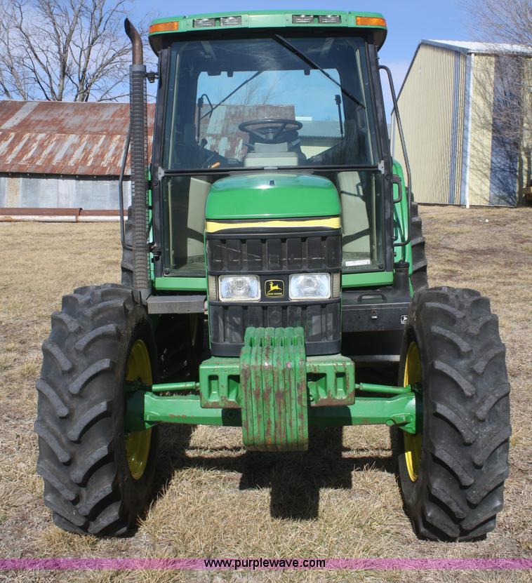 image for item V9512 2001 John Deere 6410 MFWD tractor