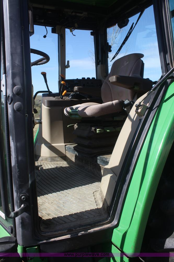 image for item V9512 2001 John Deere 6410 MFWD tractor