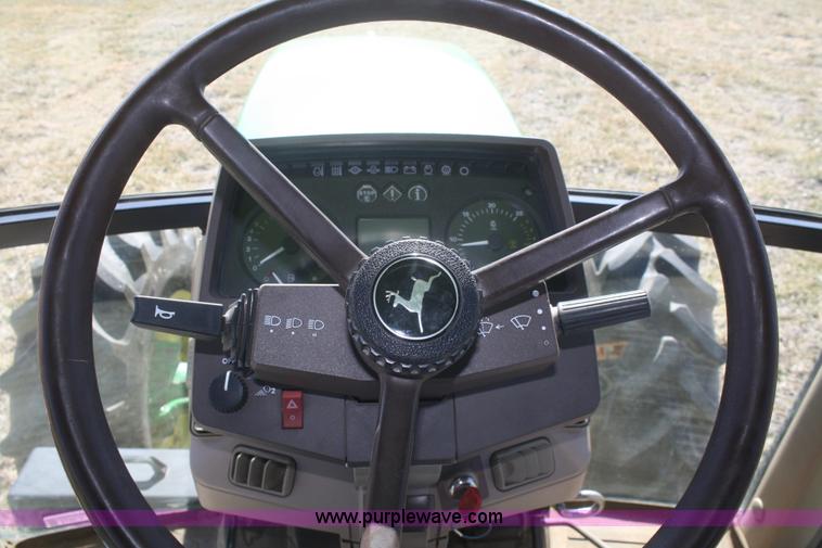 image for item V9512 2001 John Deere 6410 MFWD tractor