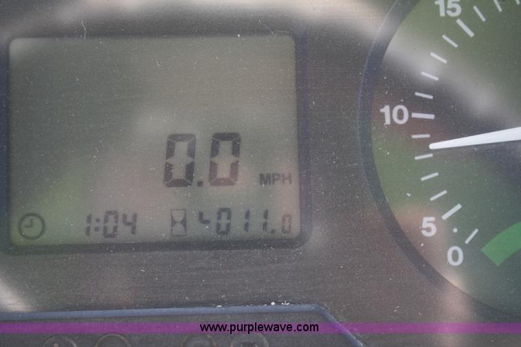 image for item V9512 2001 John Deere 6410 MFWD tractor