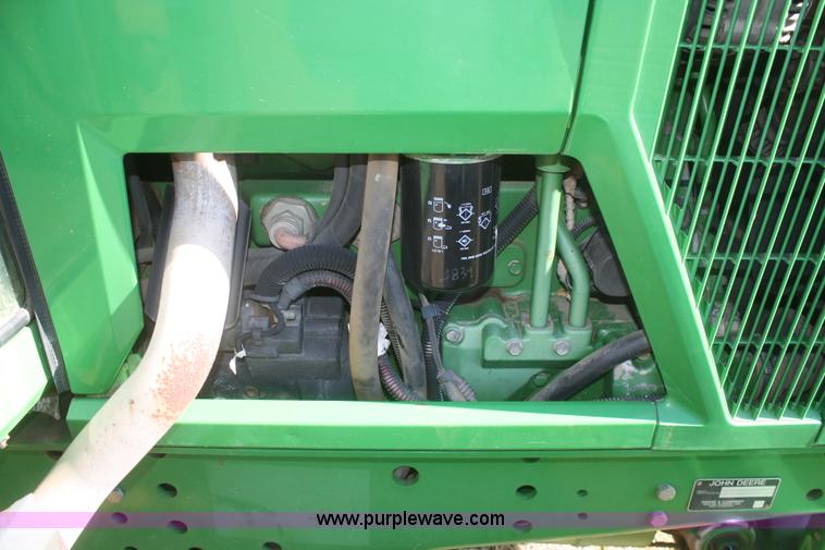 image for item V9512 2001 John Deere 6410 MFWD tractor