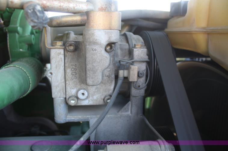 image for item V9512 2001 John Deere 6410 MFWD tractor