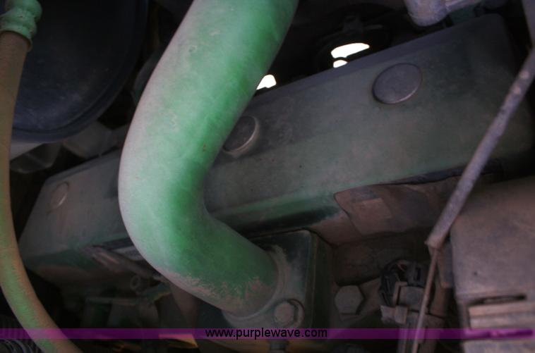 image for item V9512 2001 John Deere 6410 MFWD tractor