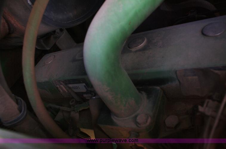 image for item V9512 2001 John Deere 6410 MFWD tractor