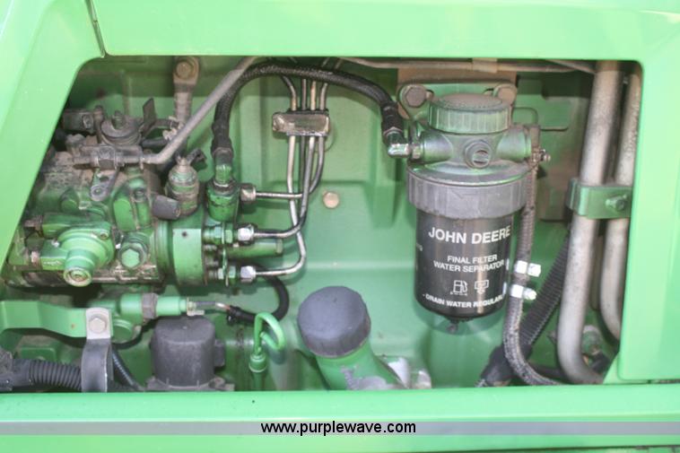 image for item V9512 2001 John Deere 6410 MFWD tractor