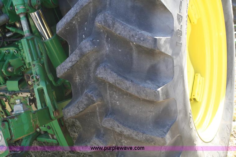 image for item V9512 2001 John Deere 6410 MFWD tractor