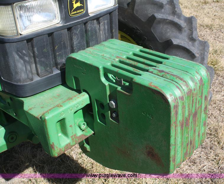 image for item V9512 2001 John Deere 6410 MFWD tractor