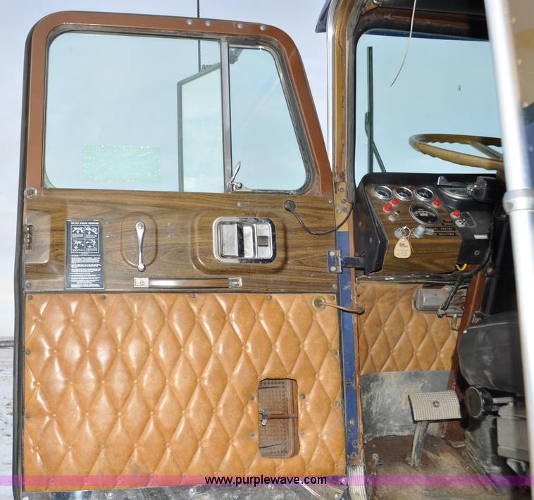 image for item C3327 1977 White Freightliner semi truck