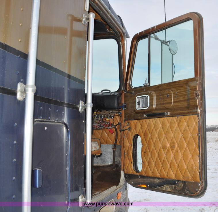 image for item C3327 1977 White Freightliner semi truck