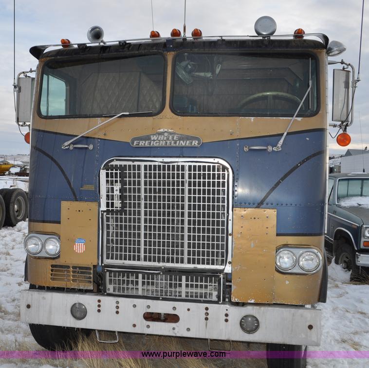 image for item C3327 1977 White Freightliner semi truck