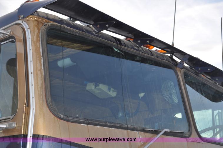 image for item C3327 1977 White Freightliner semi truck