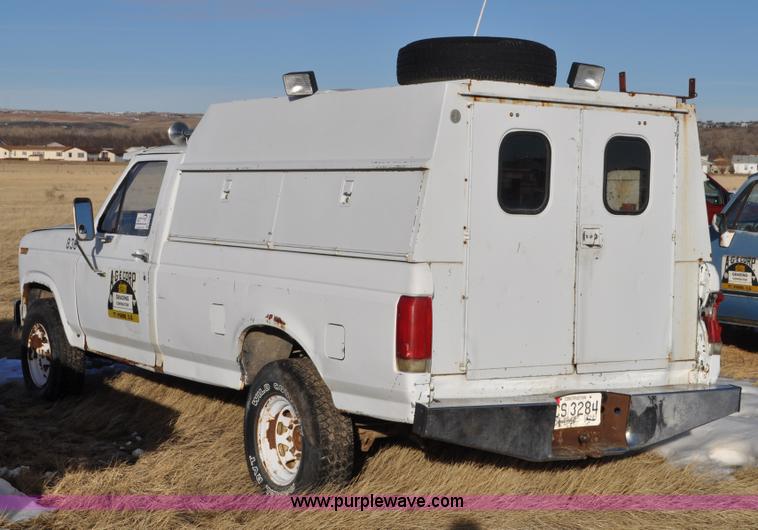 image for item C3330 1982 Ford F250 utility bed truck
