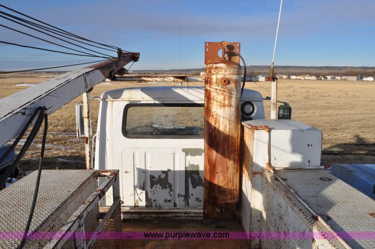 image for item C3333 1979 IHC S1824 utility bed truck