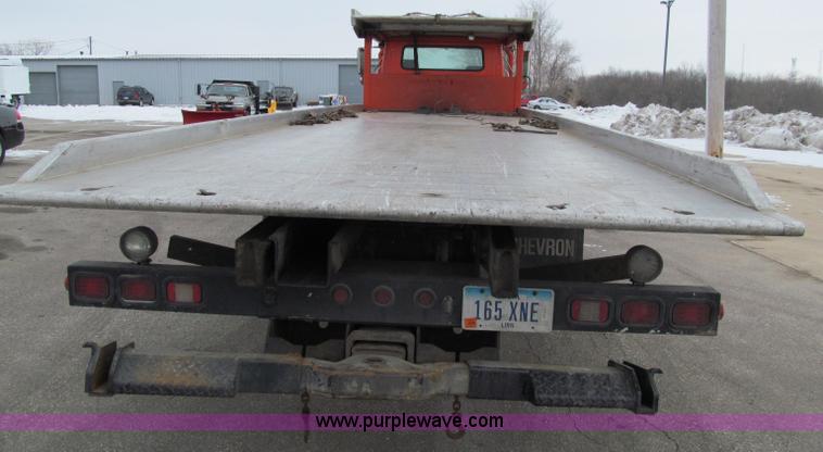image for item D7070 2002 International 4900 roll off truck