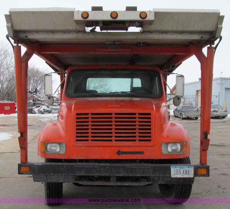 image for item D7070 2002 International 4900 roll off truck