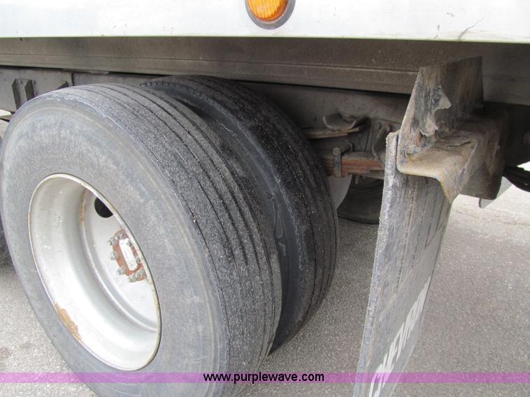 image for item D7070 2002 International 4900 roll off truck