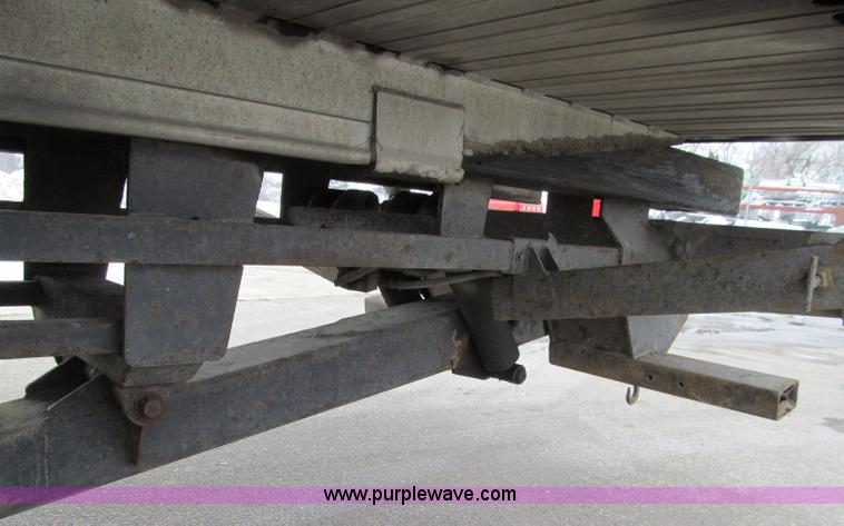image for item D7070 2002 International 4900 roll off truck