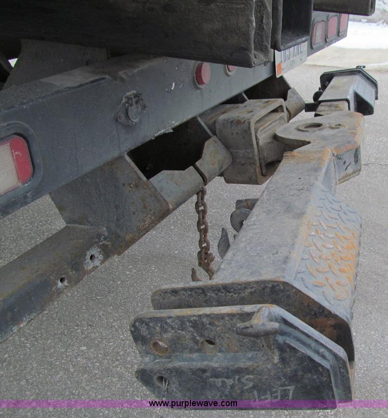 image for item D7070 2002 International 4900 roll off truck