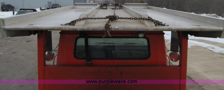 image for item D7070 2002 International 4900 roll off truck