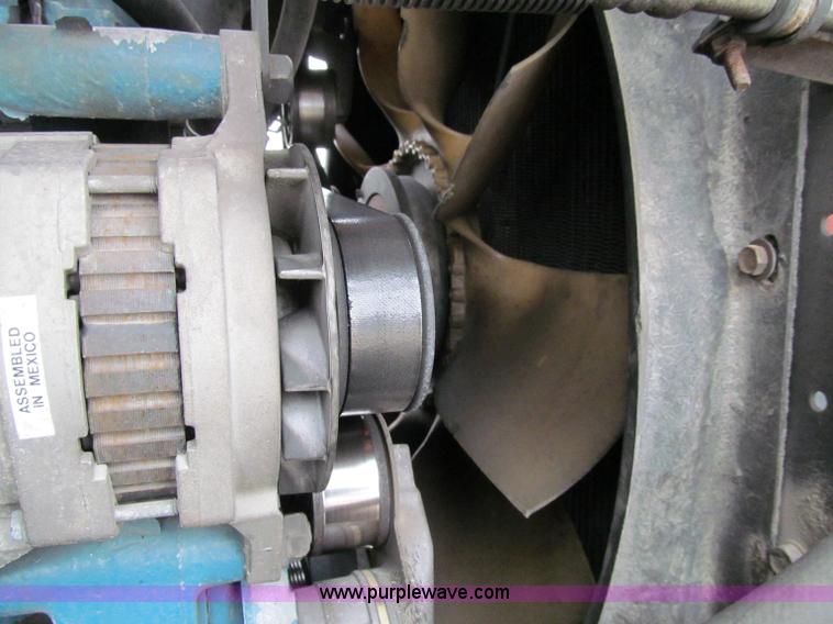 image for item D7070 2002 International 4900 roll off truck