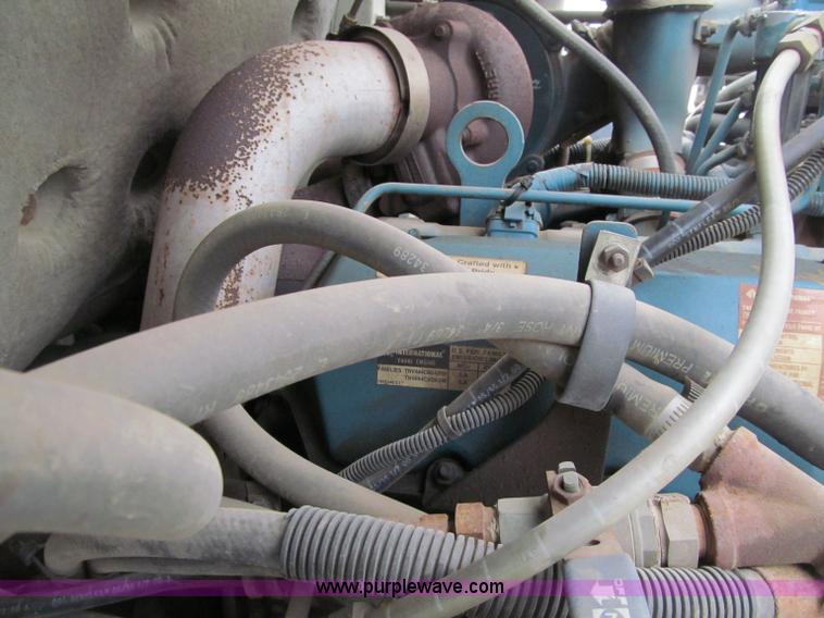 image for item F5919 1997 International 4700 Digger Derrick truck