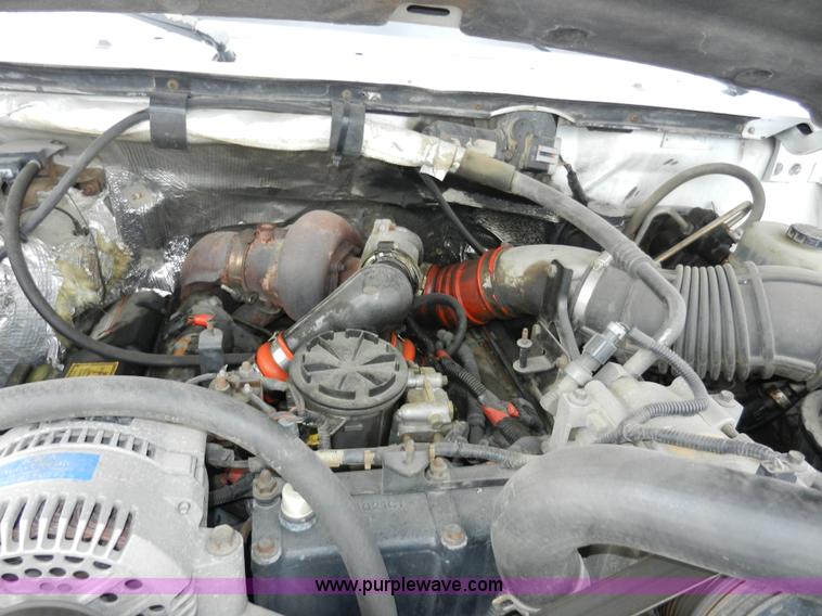 image for item A3965 1995 Ford F450 XL Super Duty flatbed pickup truck