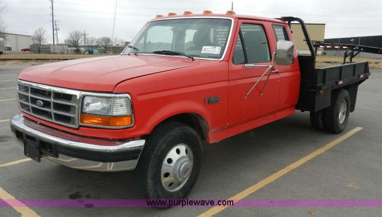 image for item A3966 1997 Ford F350 XLT flatbed pickup truck