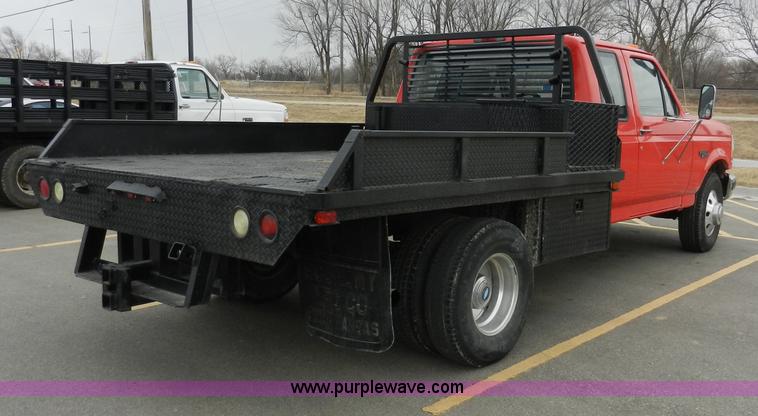 image for item A3966 1997 Ford F350 XLT flatbed pickup truck