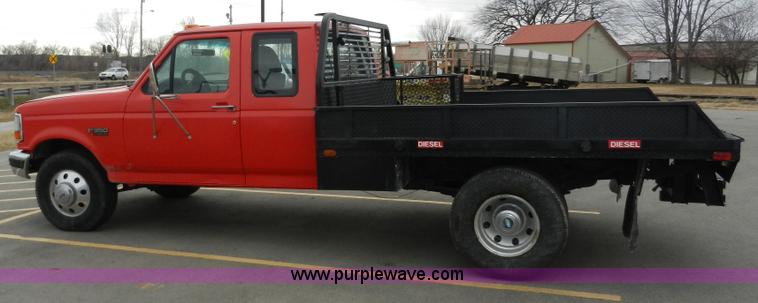 image for item A3966 1997 Ford F350 XLT flatbed pickup truck