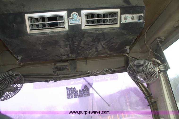 image for item F2993 1989 John Deere 770BH articulated motor grader