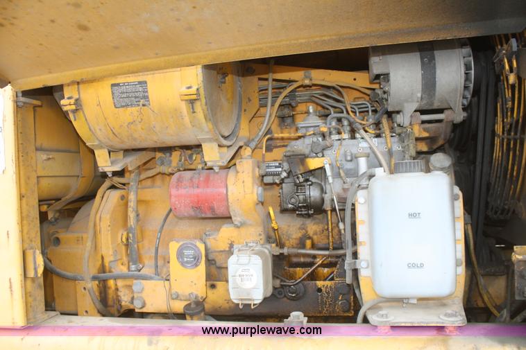 image for item F2993 1989 John Deere 770BH articulated motor grader