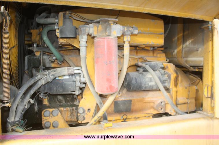 image for item F2993 1989 John Deere 770BH articulated motor grader