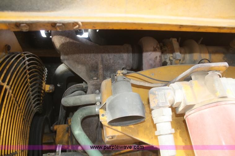 image for item F2993 1989 John Deere 770BH articulated motor grader