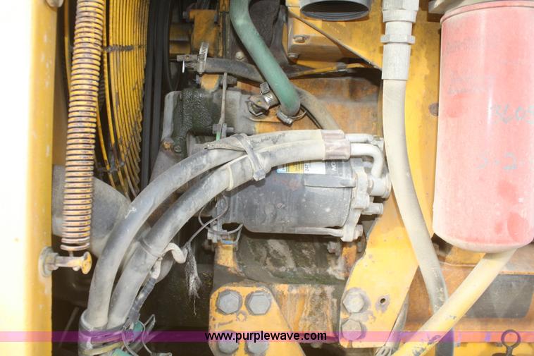 image for item F2993 1989 John Deere 770BH articulated motor grader