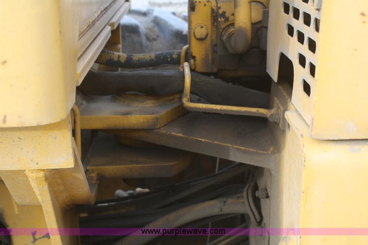 image for item F2993 1989 John Deere 770BH articulated motor grader