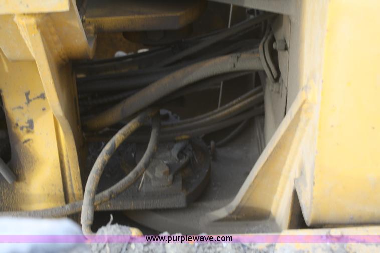 image for item F2993 1989 John Deere 770BH articulated motor grader