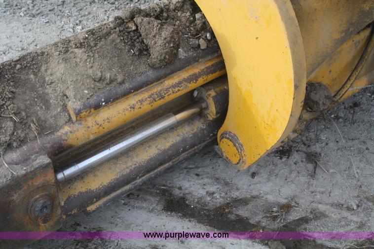 image for item F2993 1989 John Deere 770BH articulated motor grader