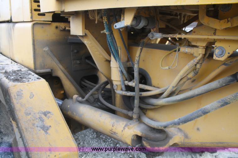 image for item F2993 1989 John Deere 770BH articulated motor grader