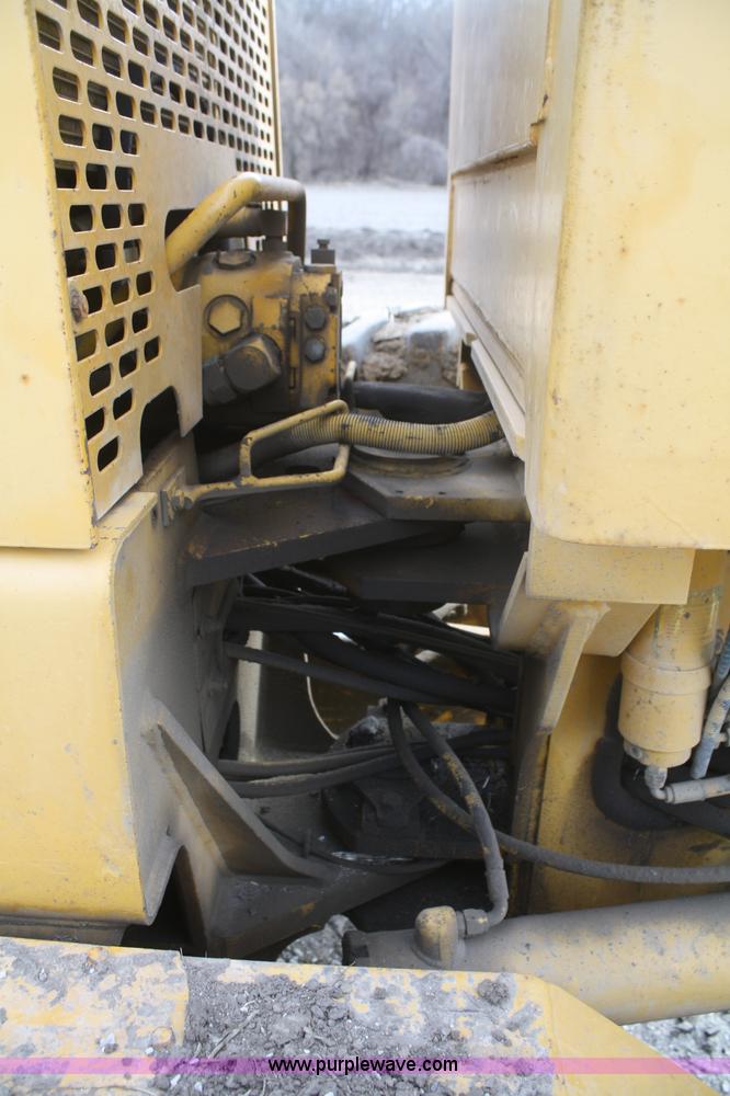 image for item F2993 1989 John Deere 770BH articulated motor grader