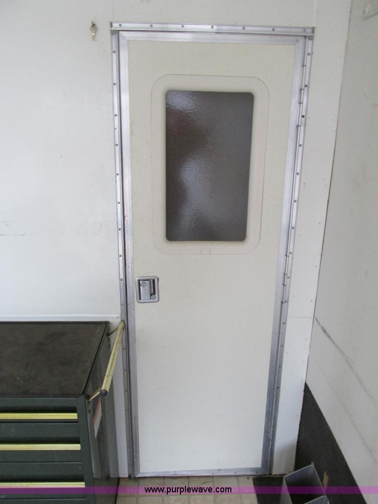 image for item F4402 2002 H&H 28' cargo trailer with living quarters