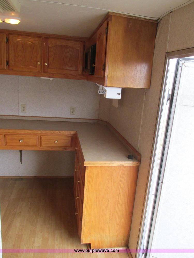 image for item F4402 2002 H&H 28' cargo trailer with living quarters