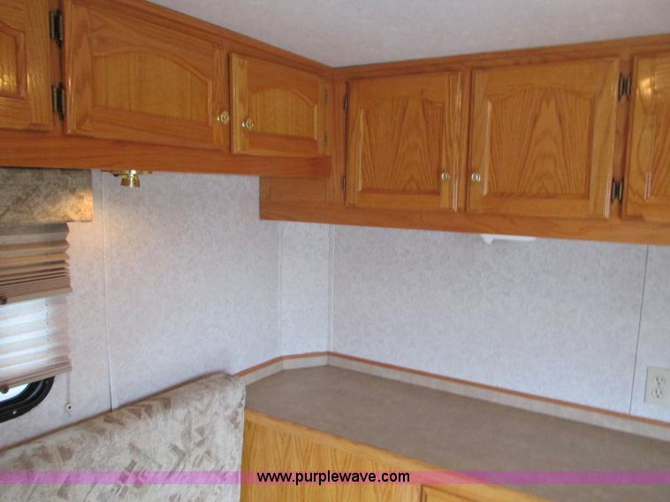 image for item F4402 2002 H&H 28' cargo trailer with living quarters